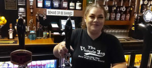 Eilin, pleasant waitress at the Victorian Inn