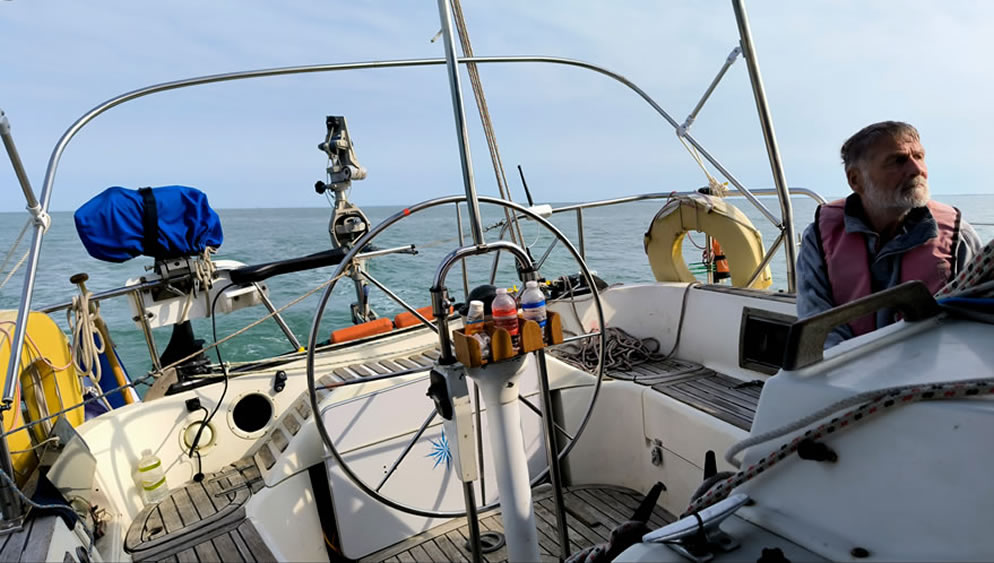 Helm locked, the small electric pilot controls the Hydrovane rudder